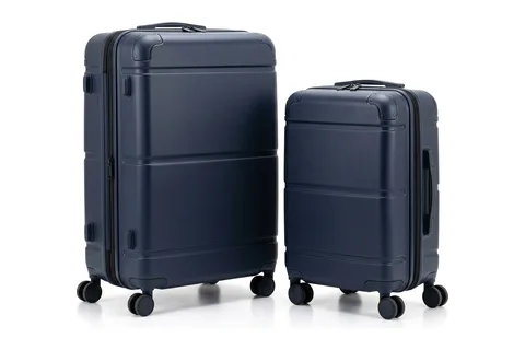 Two dark blue hard-shell suitcases, one large and one smaller